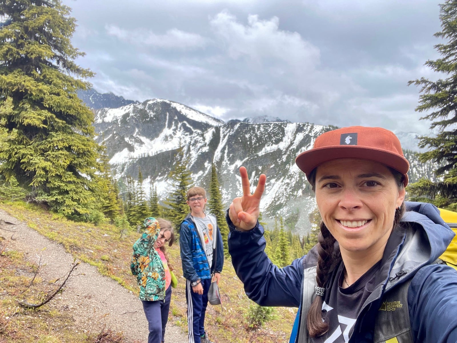 Amelie with her two kids on a mountain hike
